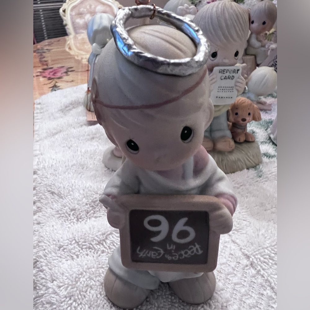 Precious Moments Figurine with Chalkboard
Peace On Earth boy Angel 1996